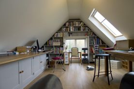 bedroom with sloped ceiling